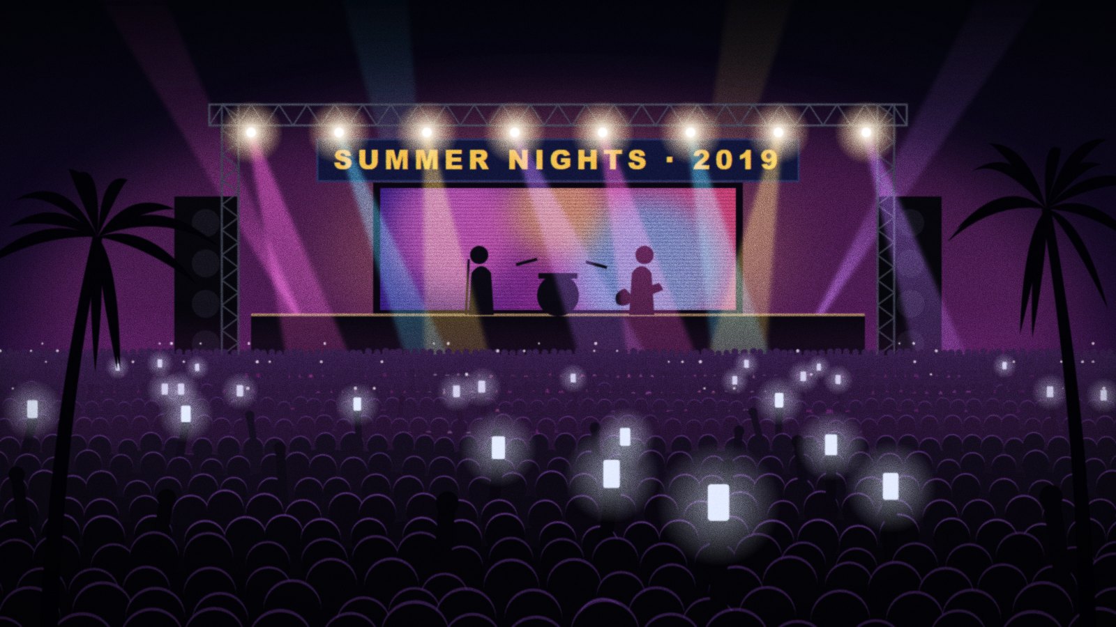 A crowd at night in front of a lit stage under a banner.